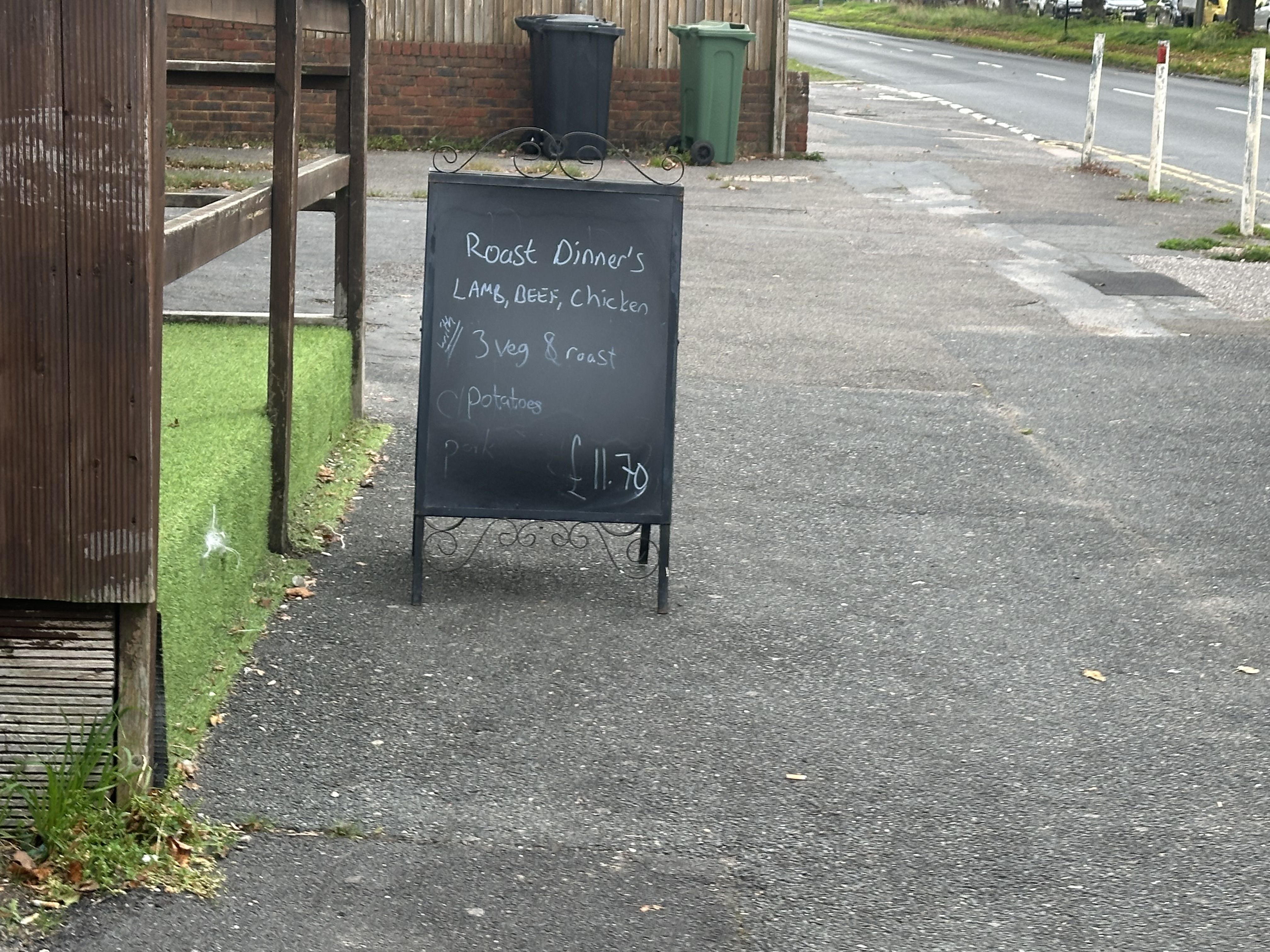 Photo of a sign advertising roast dinner's