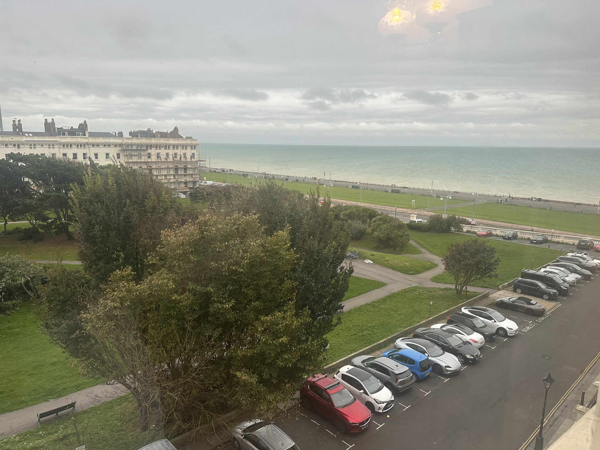 photo of the view of brighton seafront out a window