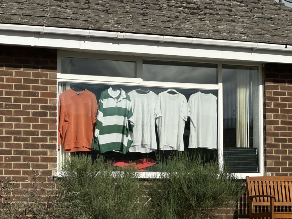 Photo of clothes in a window